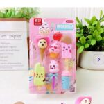 Cute ice cream-themed erasers in pink and pastel colors, shaped like cones, popsicles, and milkshakes.