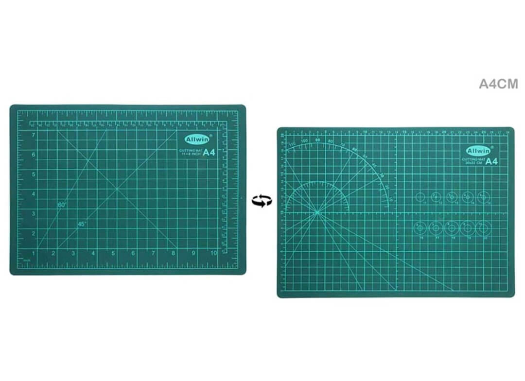 Green A4-size self-healing double-sided cutting mat with grid and angle guides.