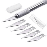 Precision craft knife with metal grip and 5 extra replaceable blades for cutting.