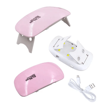 SUN5 mini UV LED nail lamp with foldable legs, 6 LED beads, USB cable, and compact pink body for curing gel nails and resin.