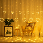 Decorative heart-shaped LED clip lights for displaying photos and creating ambiance.